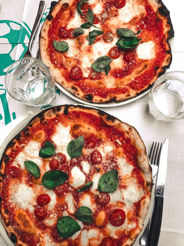 Two Italian Pizzas on a Table
